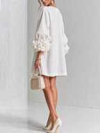 AMPARO | Vestido corto con botones de flor y mangas abullonadas