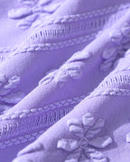 EMMA | Conjunto de bikini morado con cuello en U y estampado floral, con cordón ajustable